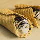 Image for article titled Ben and Jerry's new ice cream burrito is happiness in a waffle wrap